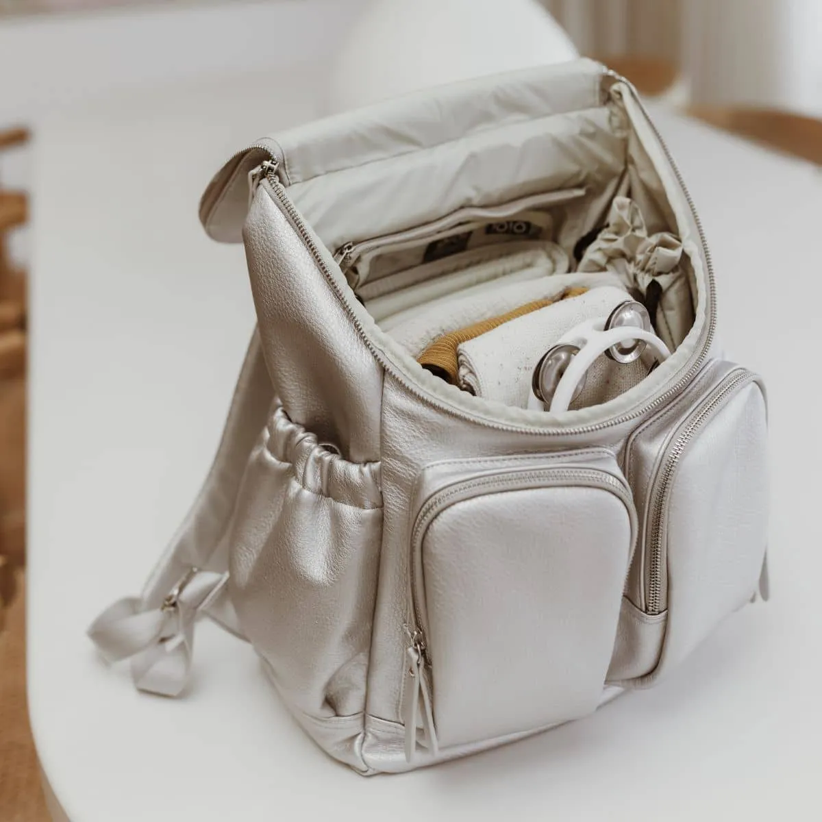 OiOi Vegan Leather Nappy Backpack - Metallic Silver Dimple